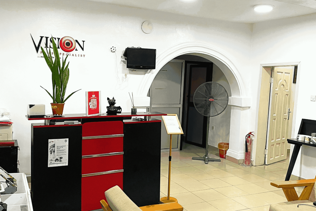 Interior of Vision Plus Specialist Eye Clinic in Ikeja, showcasing modern diagnostic eye equipment, professional optometrists attending to patients, and a welcoming environment for comprehensive eye care in Lagos