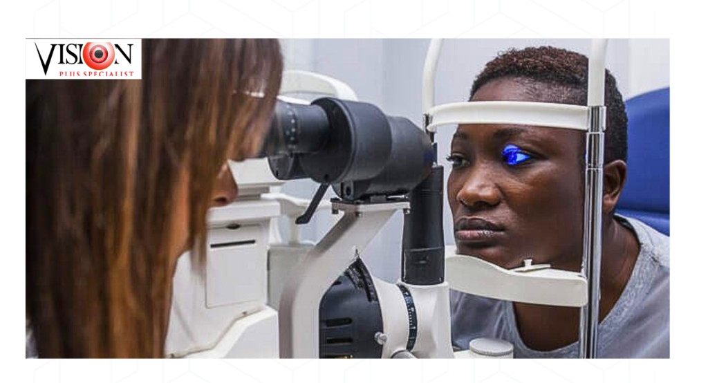 Experienced optician conducting an eye test for a patient at Vision Plus Specialist Eye Clinic, 30 Babatunde Jose Street, Victoria Island, Lagos – a leading eye clinic in Victoria Island offering comprehensive eye care services.