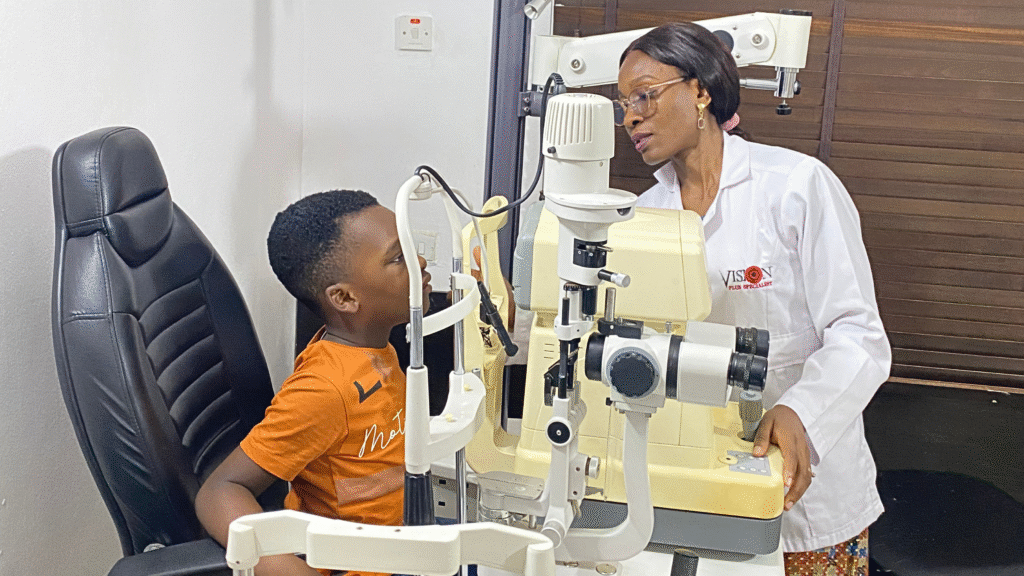 Optometrist in Victoria Island Lagos conducting a professional contact lens fitting for a patient at Vision Plus Specialist Eye Clinic